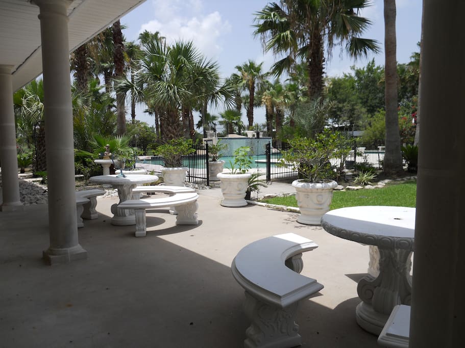 Relax on the patio by the pool
