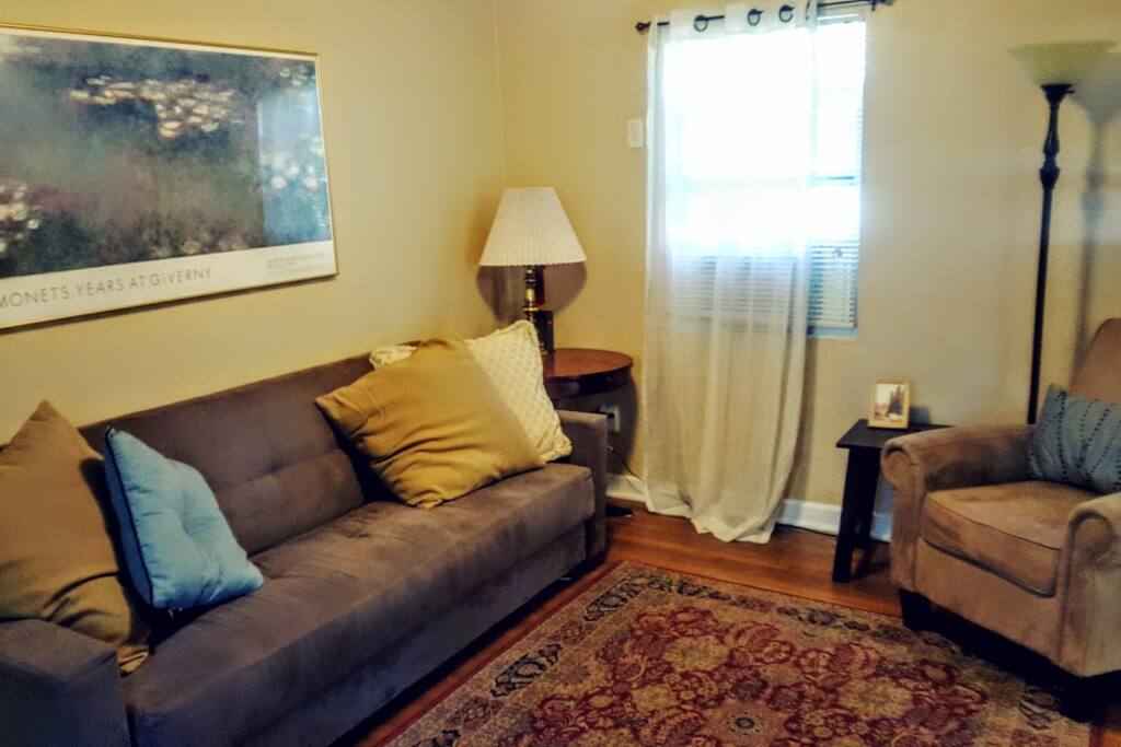 The living room as you first enter the cottage. Futon folds out into a bed. Extra linens provided.