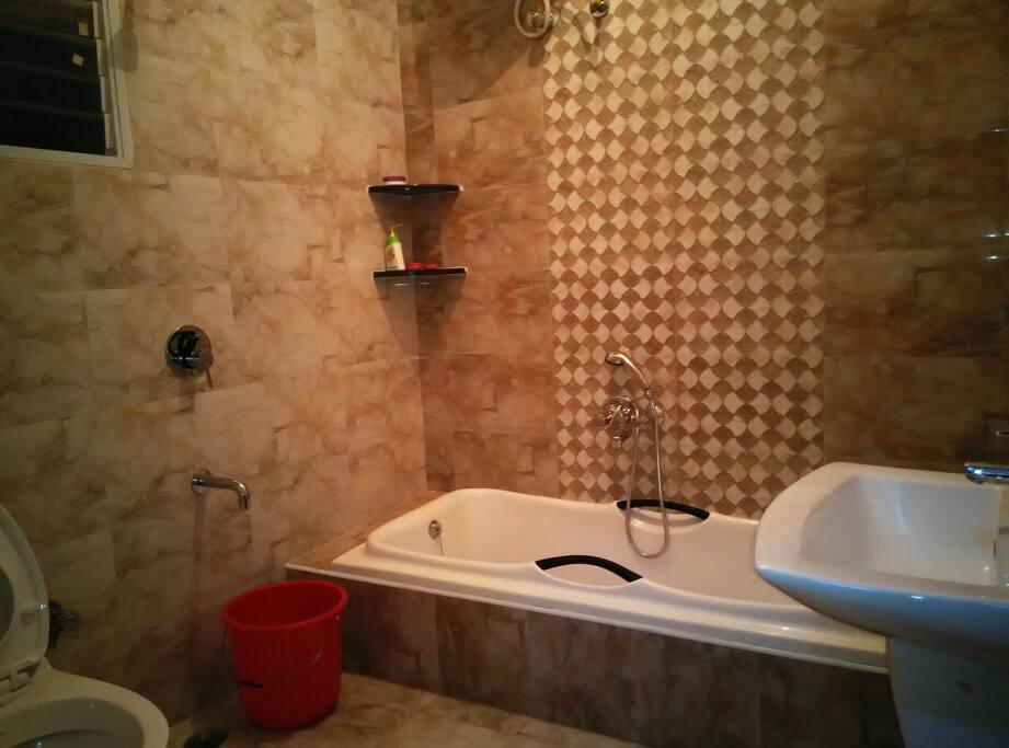 Large Bath room with tub and shower