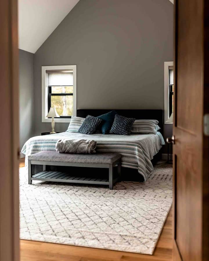 View the mountains from this spacious master bedroom.