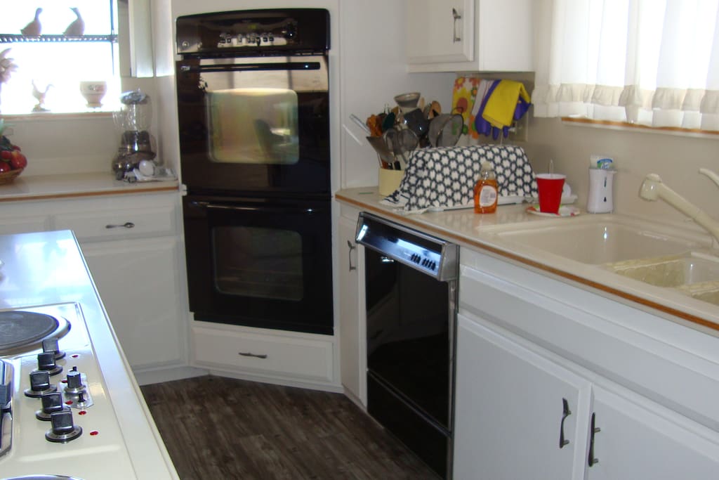 Portion of kitchen, microwave oven is located in island of kitchen