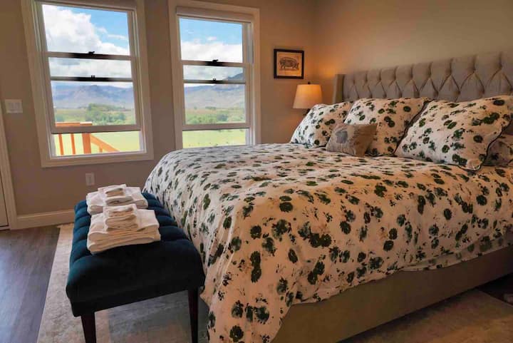 The crown jewel of SouthFork bedroom views: the “West Bedroom”.  Guests have to play a game of Diamond Bar 4-across to decide who wins this accommodation.  A private exterior door leads you to your own patio to enjoy your morning pick-me-up beverage.