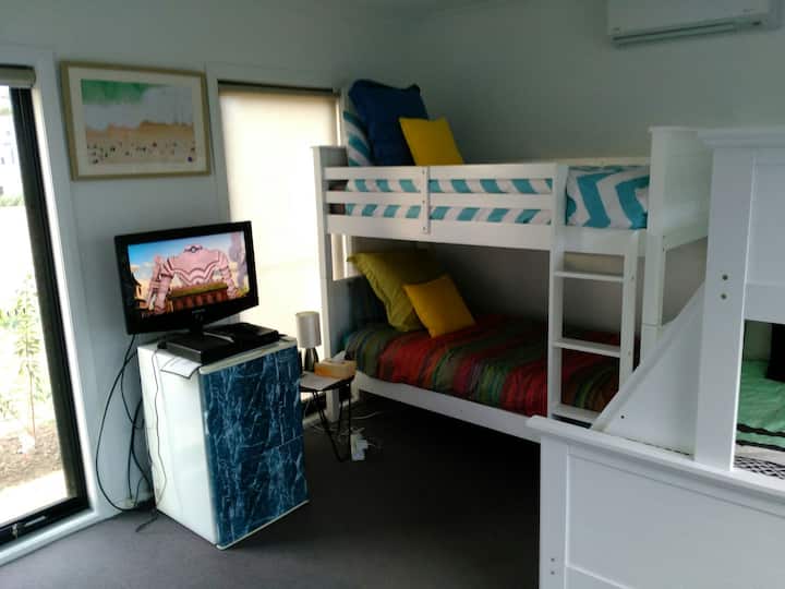 Fourth bedroom/rumpus, sleeps 5  and includes second TV (free to air only).
