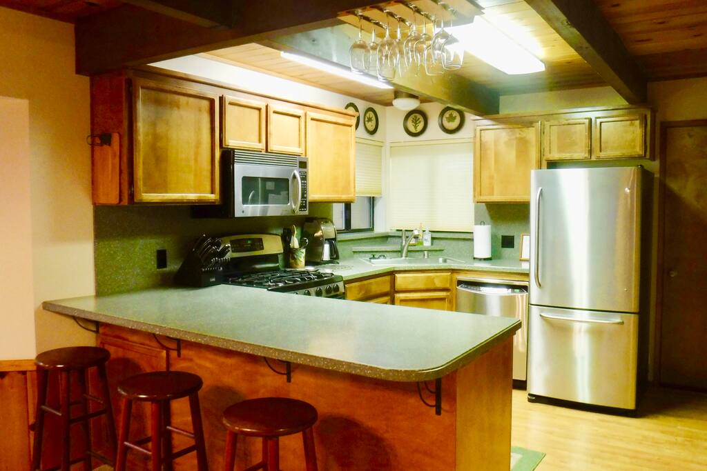 Three bar stools for hanging out around the kitchen.