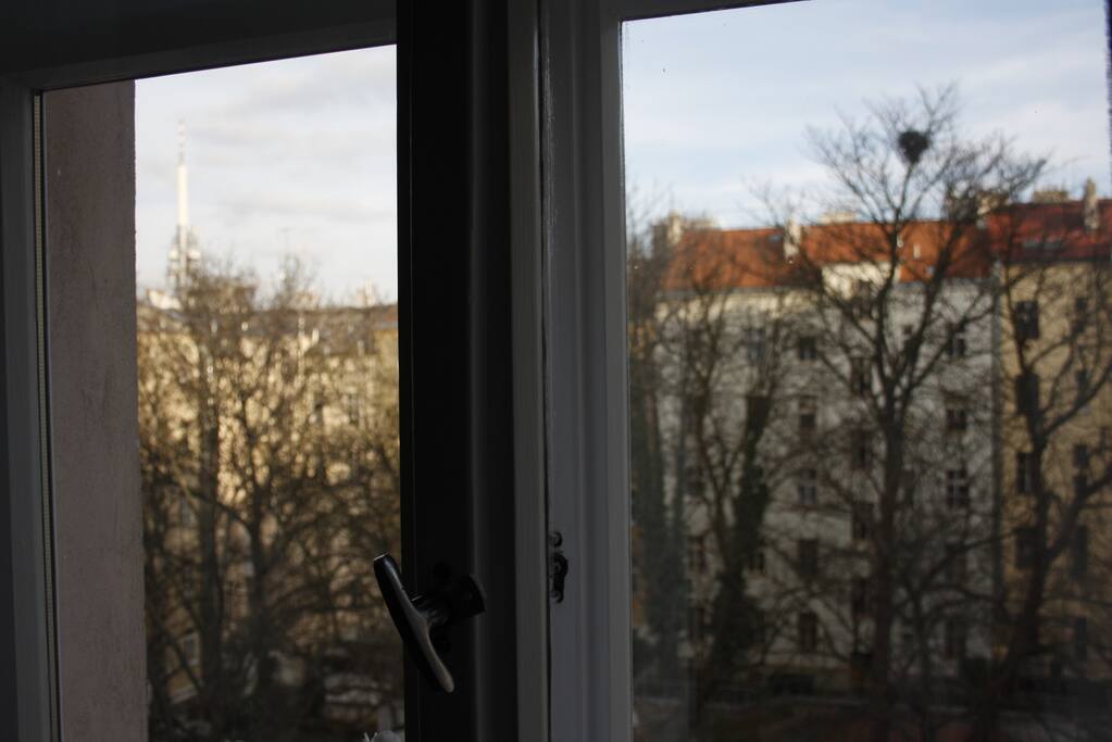 KITCHEN - There is a big terrace with a really nice view from the 5th floor available for both rooms. You can use a bathroom, separated WC and spacious - fully equiped - kitchen with big table. There are also 3 bikes for your unlimited move around the city.