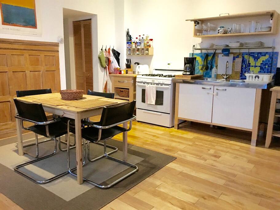 A more current look with 4 nice leather chairs at the table