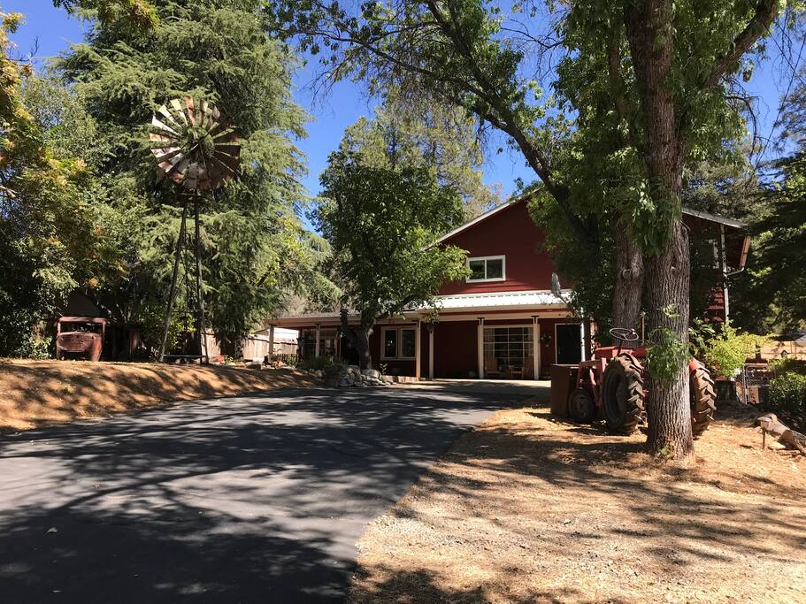 Kish Camp Vacation apartment is on the left as you approach the house located behind the walnut trees and Koi pond