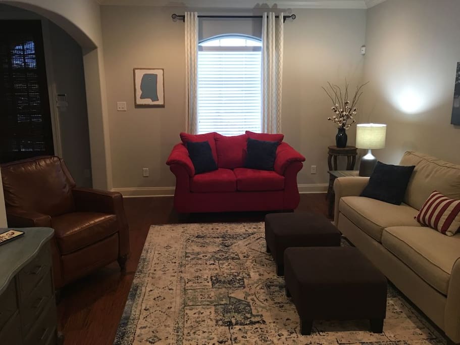 Living room, love seat, recliner and sofa that has sleeper bed too
