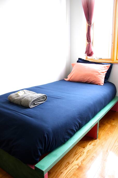 bed with luggage storage under