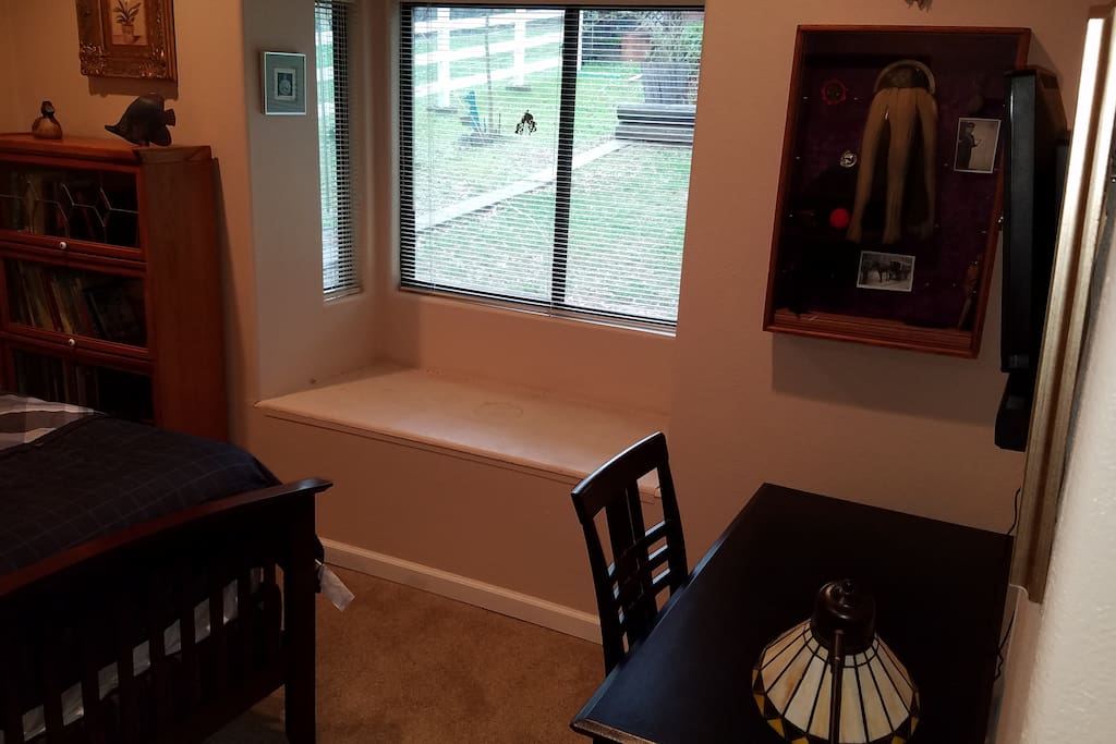 Desk with window seat.