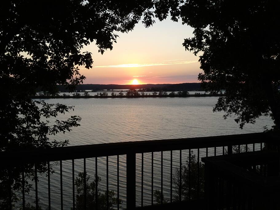 Autumn sunset from the deck. There is a stony beach so we recommend shoes/sandals that can go in the water if you want to swim or walk along the edge.