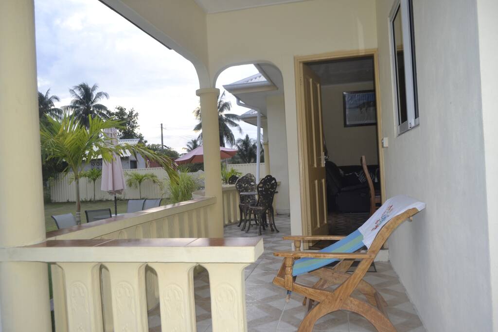 Relax with a beer under the verandah in your 'fotey' (easy chair)
