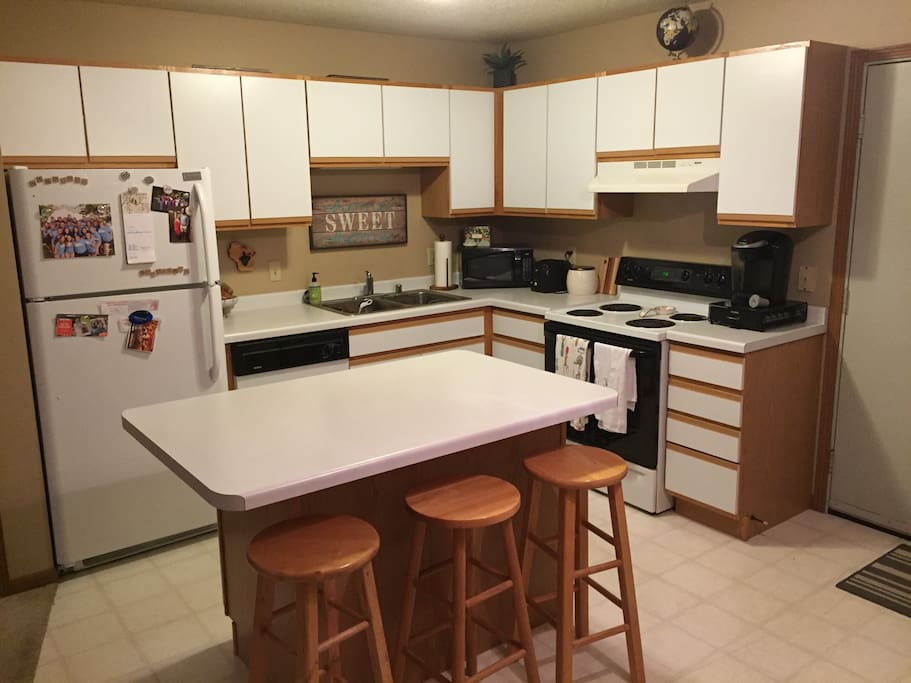 Our kitchen. You may use our appliances and dishes while making/eating your meals, we just ask that you clean up after yourself and put things back where you found them.