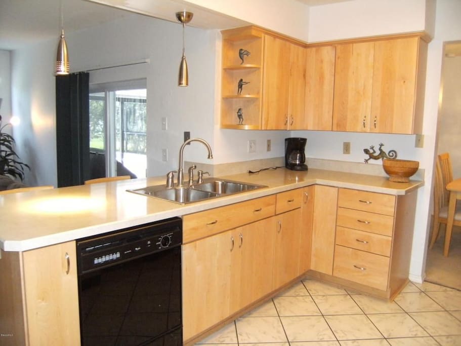Bright kitchen opens to family room