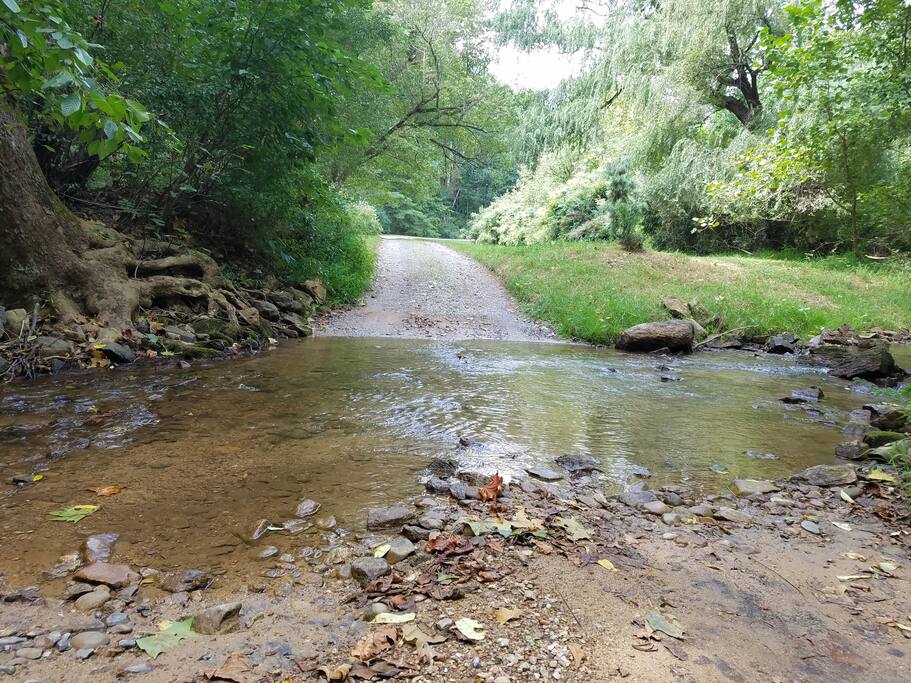 Welcome to 'n o o n'! Drive slowly over the 'Country Moat'. Feel free to stop and dip your toes and refresh after a long day of travel.