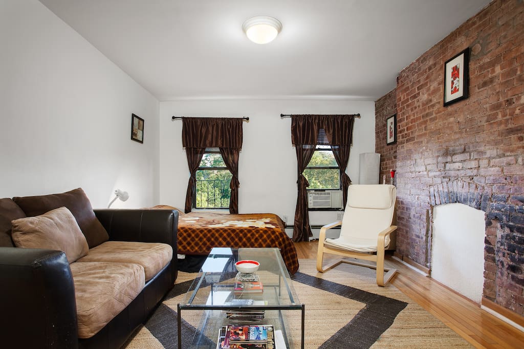 Cozy apartment  with exposed brick  HEART of NYC  