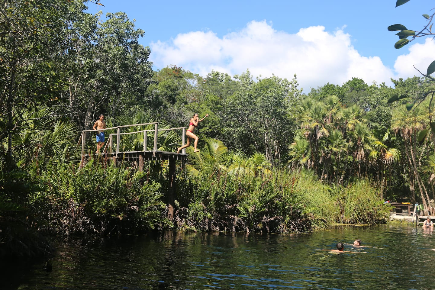 group of tourists biking around Tulum Pueblo