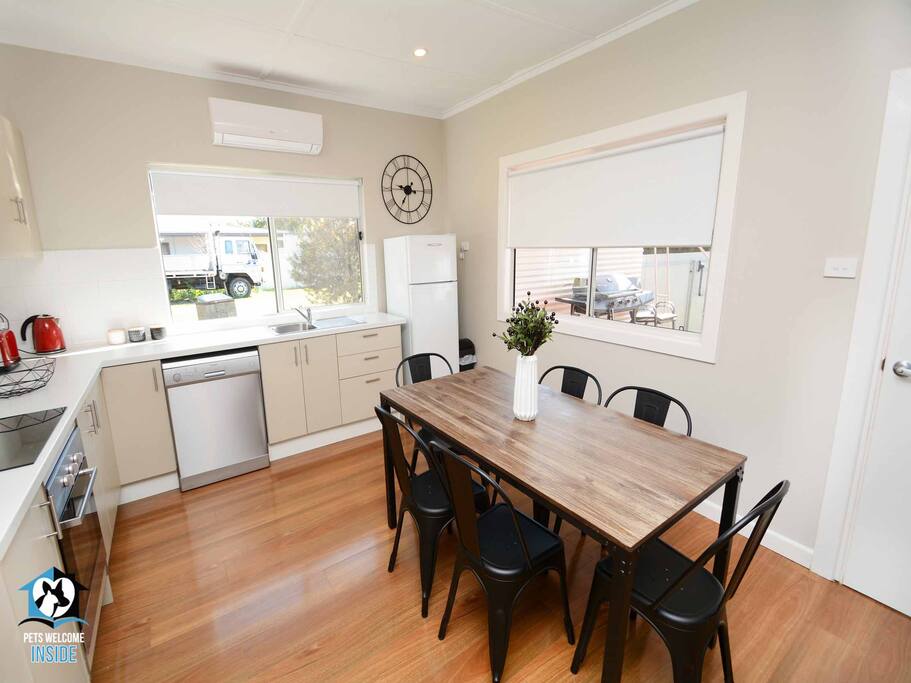 Big windows to let in lots of light. Floorboards throughout.