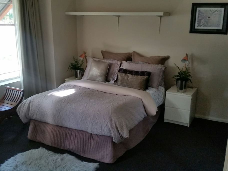 Double Bed with Mirrored wardrobe.