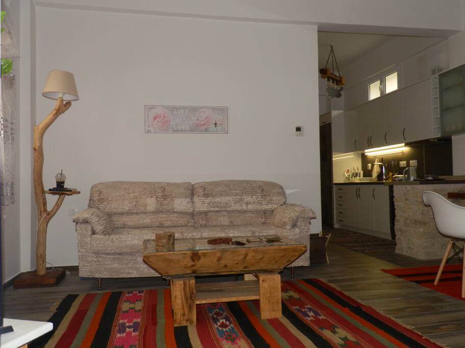The living room and the kitchen