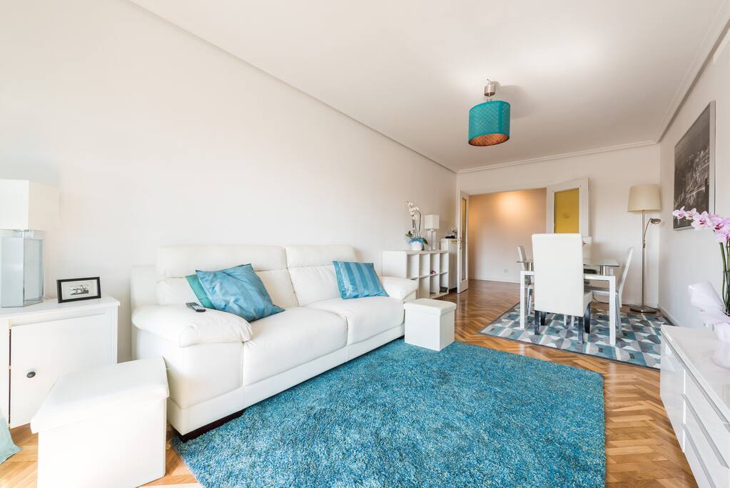 Large, bright living room and dining room.