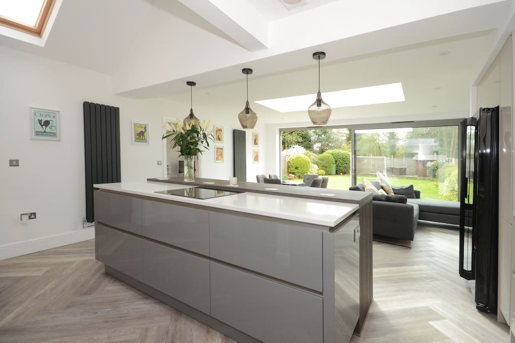 view to the sliding doors and garden, with BBQ