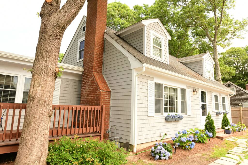 Another view of the front of the house, including the wrap-around deck