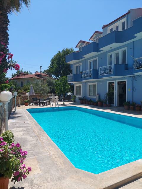 Tranquil Neighborhood Apartment with Pool and Garden
