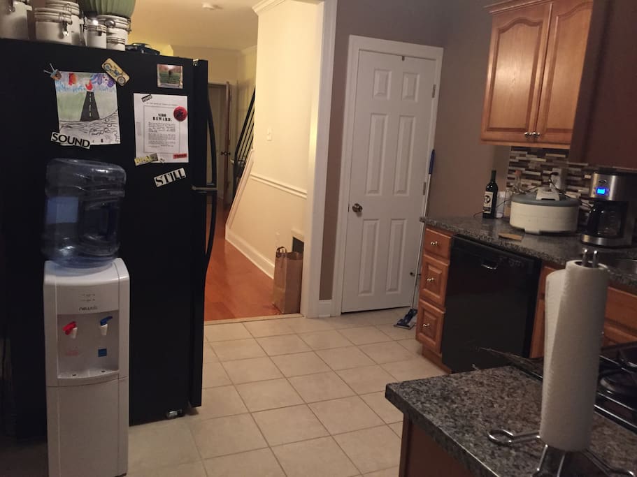 Kitchen Amenities include: Cold/Hot water fountain, dishwasher, Coffee maker, Vitamix, Food dehydrator. Door leads to basement (washer/dryer access)