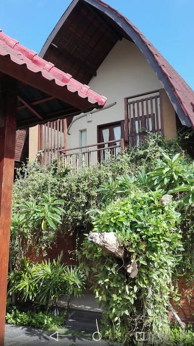 Balcony sitting both on ground and first floor.
