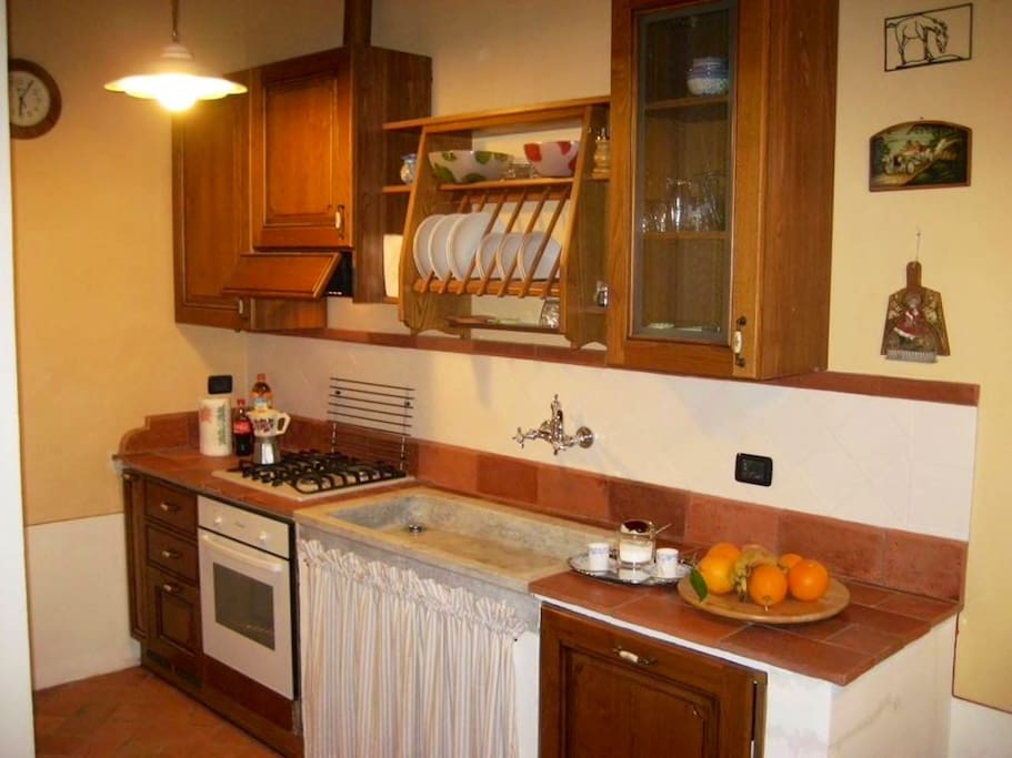 Well equipped kitchen with oven, dishwasher, coffee machine, toaster and kettle.