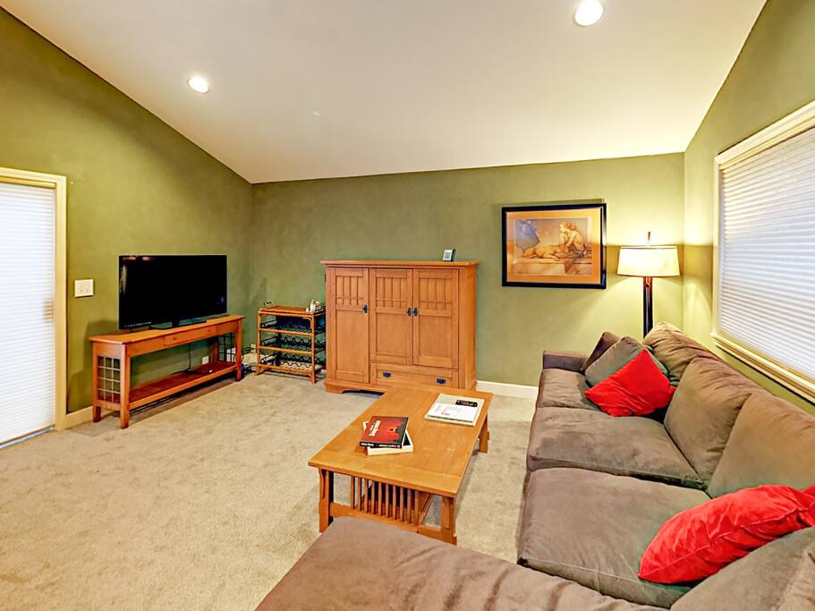 Screen a film on the 55” smart TV with Amazon Prime and Netflix in the family room.