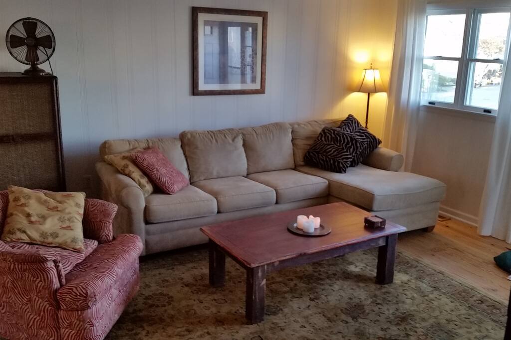 Comfortable living room open to dining room and kitchen