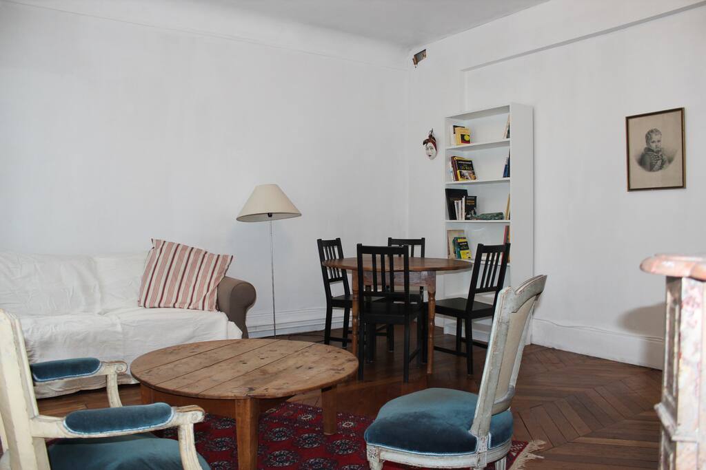 living room with a convertible sofa