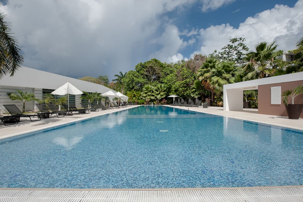 Pool at Club House, perfect to enjoy it after the gym, sauna or steam room. A few steps from the spa and our building.