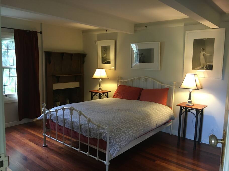 Comfortable Queen size bed in spacious, yet warm and inviting bedroom