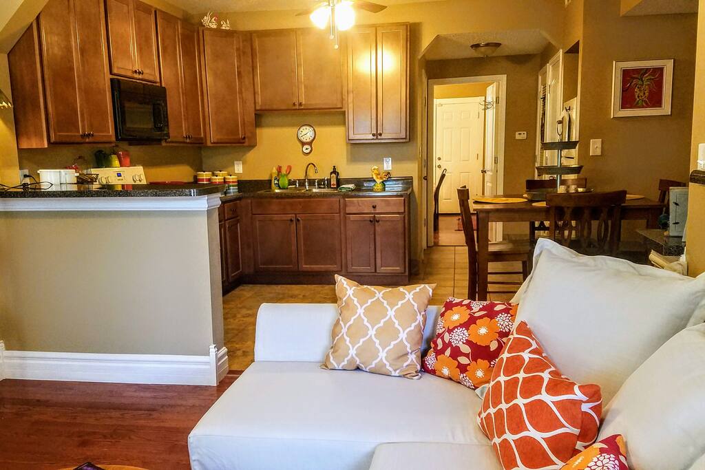 Sofa in living room extends to make queen-size bed