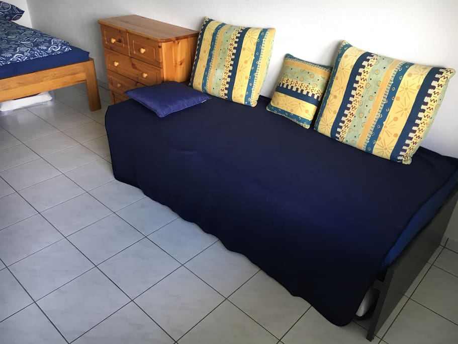 Couch bed, bottom bed pulls out to twin bed.