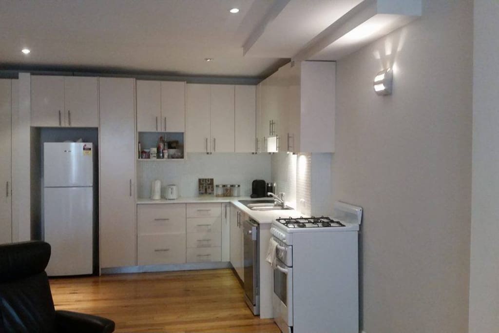Large kitchen with microwave, gas oven, coffee machine and all pots and pans !