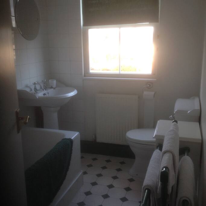 Full-size private bathroom on same floor