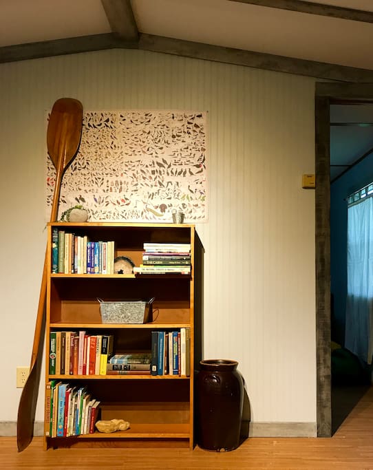 High ceilings. Clutter-free. Guide books. Nature books. Books for kids.
