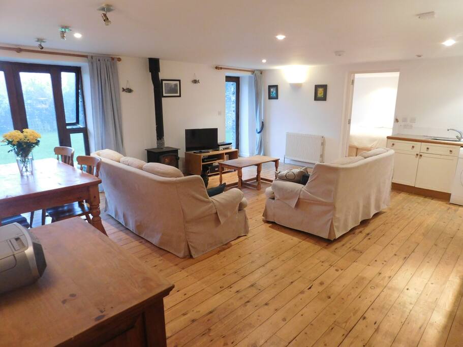Doors open onto patio and lawned area