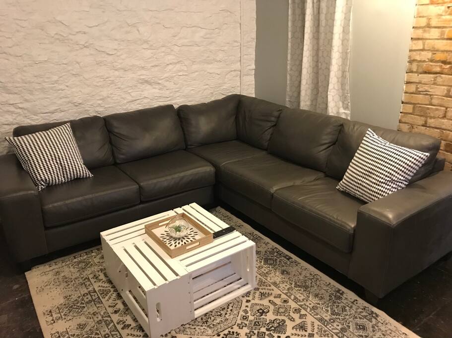 Super comfy couch is bedroom #2. Great way to utilize space for more sleepers ☺️