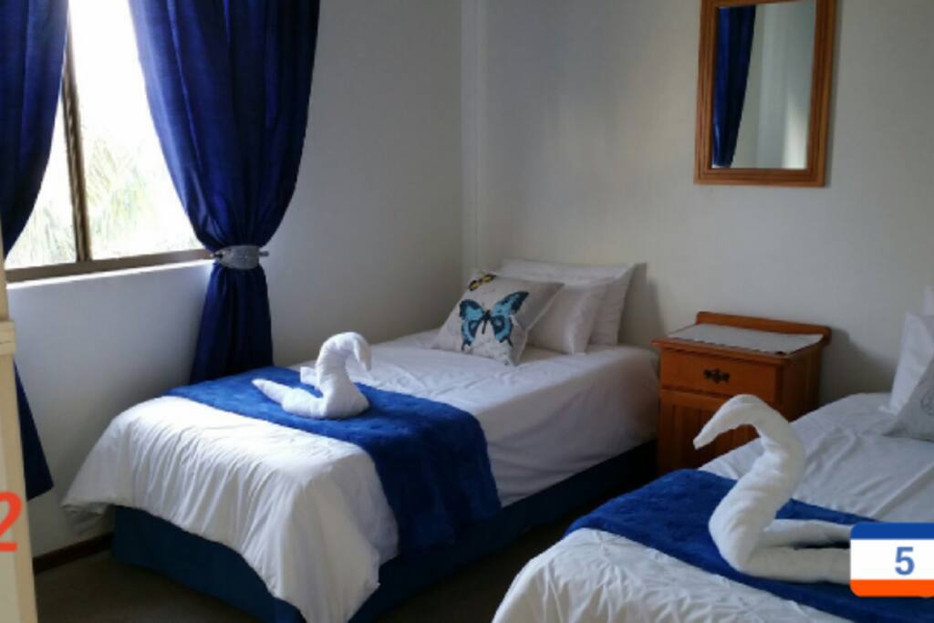 Room 2, Sharing A Bathroom with Room 3. Partial Sea View.
