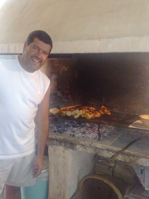 Parrilla y anfitrión asador