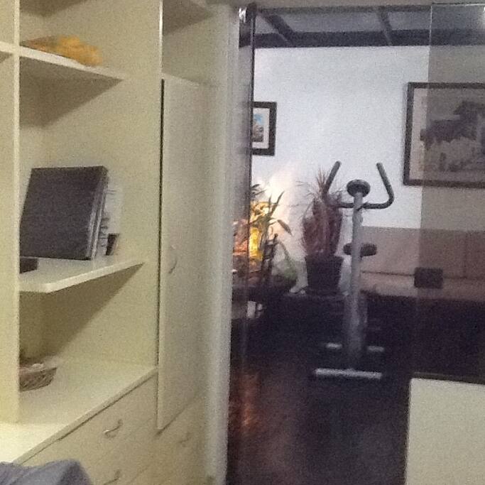Additional big furniture in front of the bed for extra space