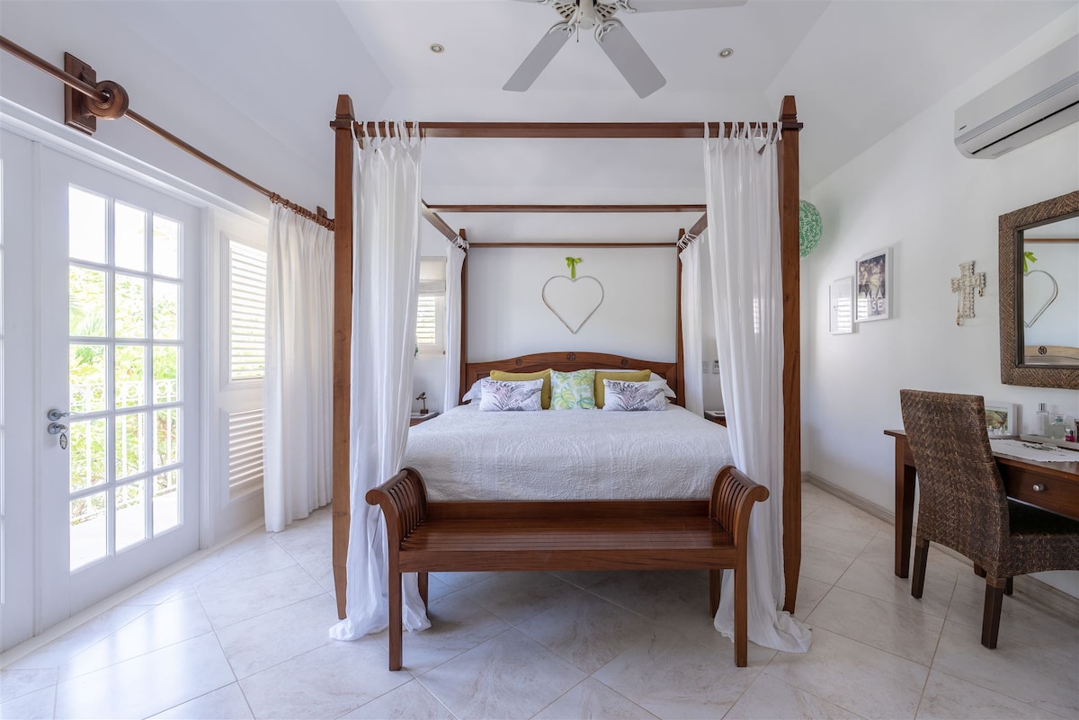 The air-conditioned master bedroom with  Super King Bed, dressing table and fabulous views!