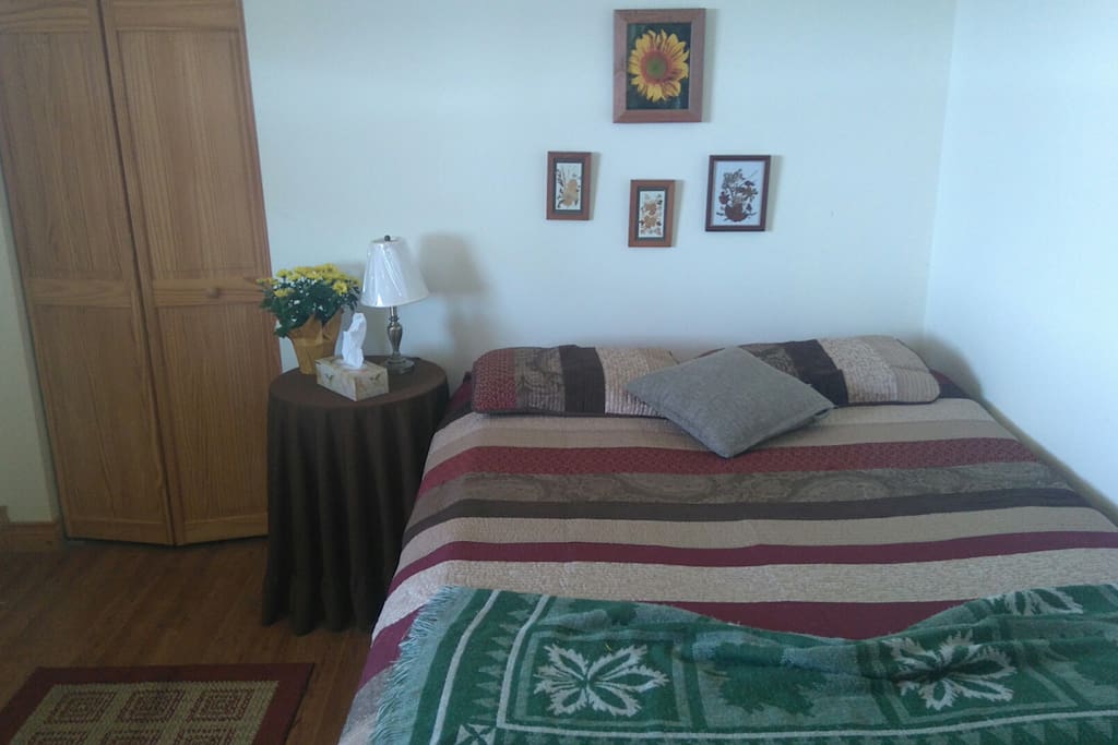 Cozy warm comfortable room with a queen size bed