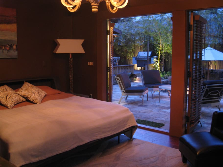 Your bedroom has 2 double French doors that open to the pool and fire pit.