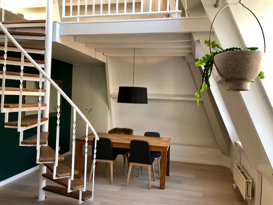 Dining table, stairs to living room upstairs